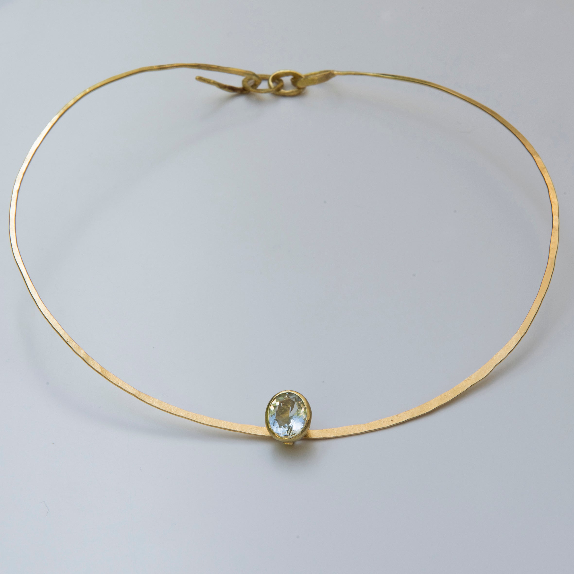 Gold Torc with Aquamarine Pendant