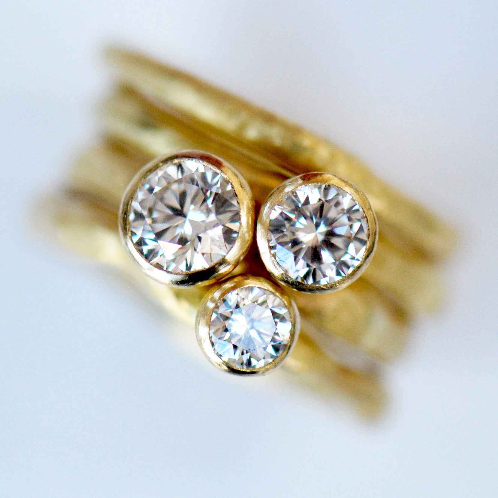 Set of three diamond rings with organic band by Disa Allsopp