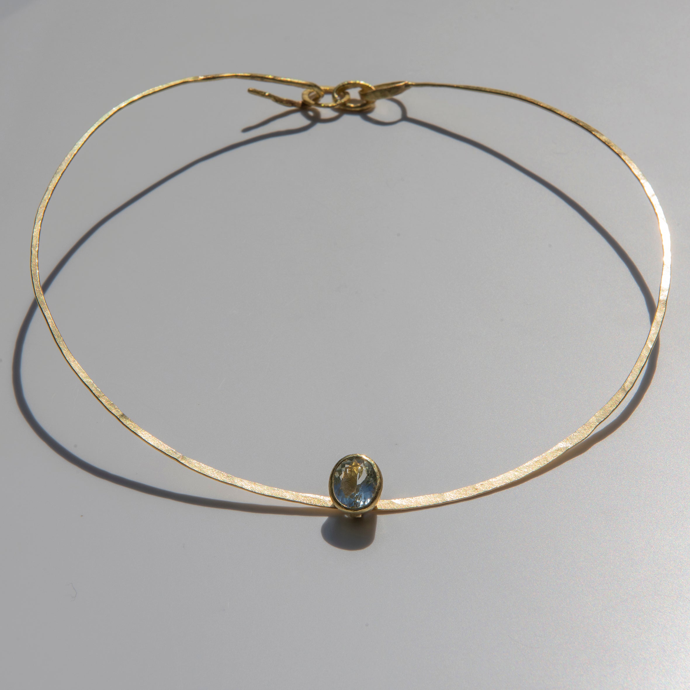 Gold Torc with Aquamarine Pendant