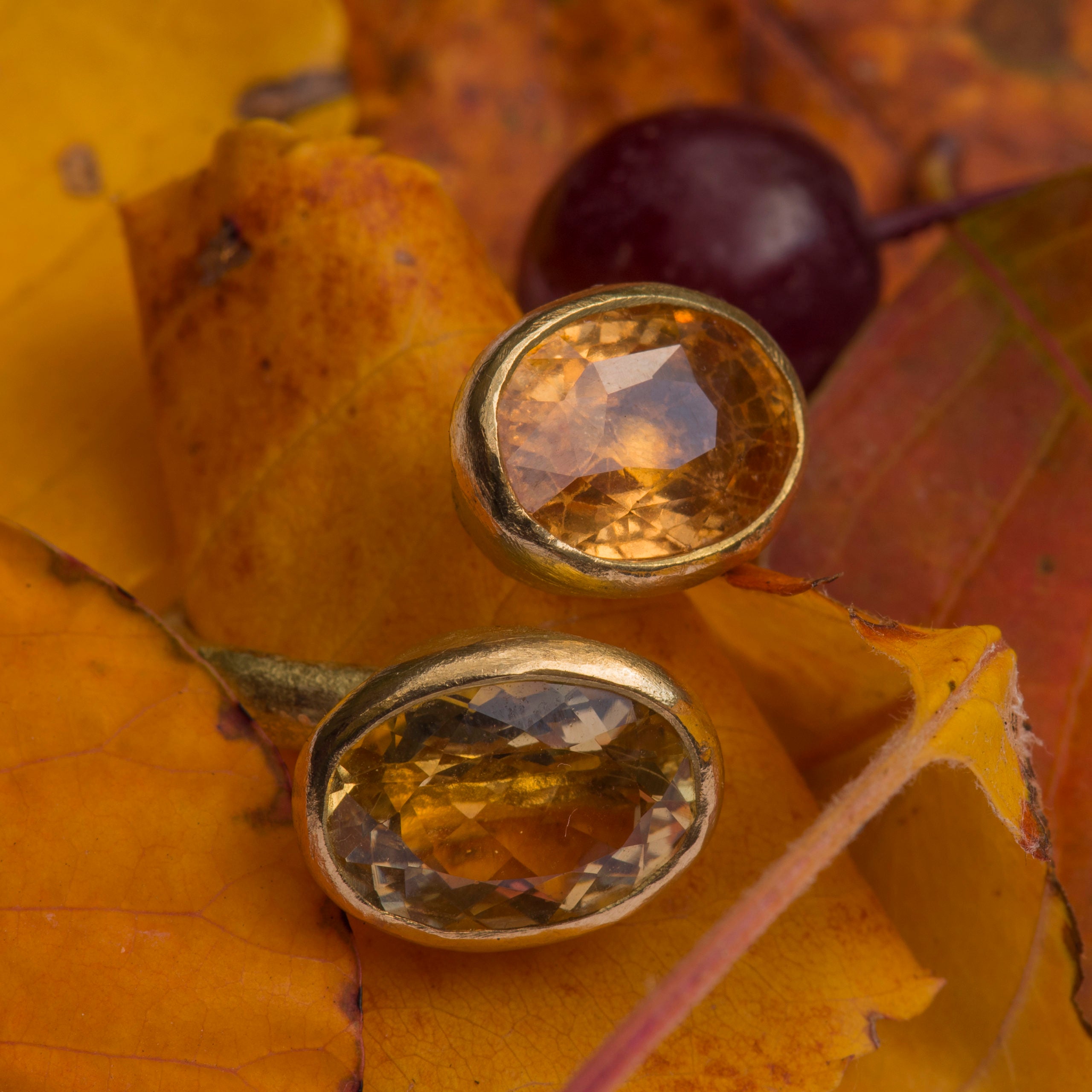 Hessonite garnet/yellow beryl double gold ring by Disa Allsopp